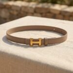 Elegant Slim Leather Belt with Signature Gold H-Buckle – Taupe - Image 4