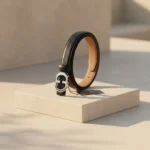 Slim black leather womens belt with a polished silver tone interlocking buckle (4)