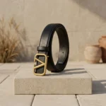 Women wearing a black leather belt with a gold V logo buckle (3)