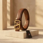 Womens tan leather belt with a gold V shaped buckle (1)